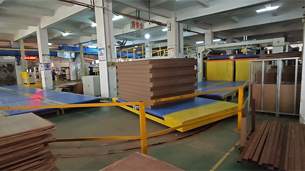 Corrugated Cardboard Handling & Conveying System (High-Level Stack Counting & Strapping)